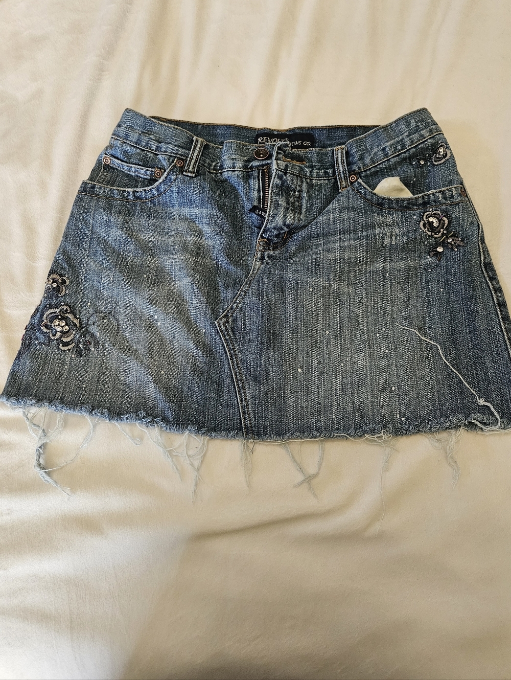 Revo Distressed Embroidered Denim Mini Skirt in Blue